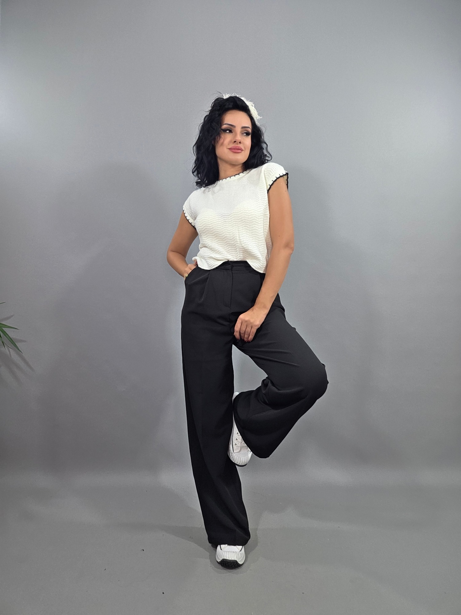 Biyeli yumoş triko süveter